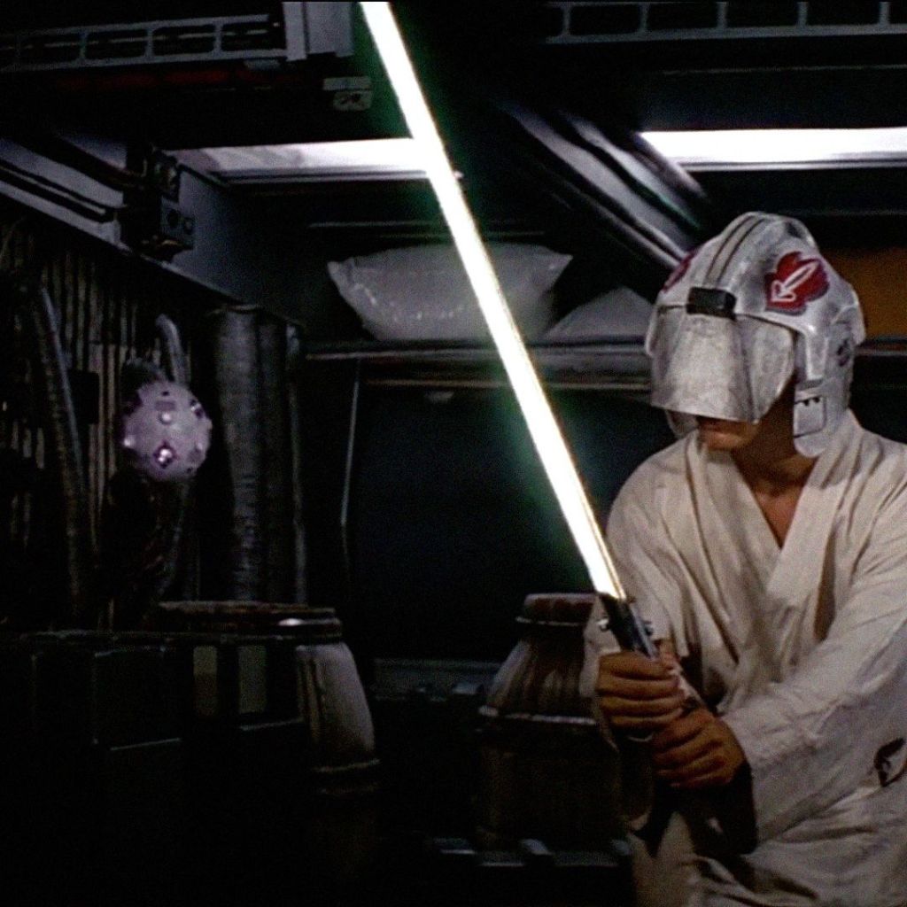 At Obi-Wan Kenobi's request, Luke Skywalker attempts lightsaber training without the benefit of physical sight. 